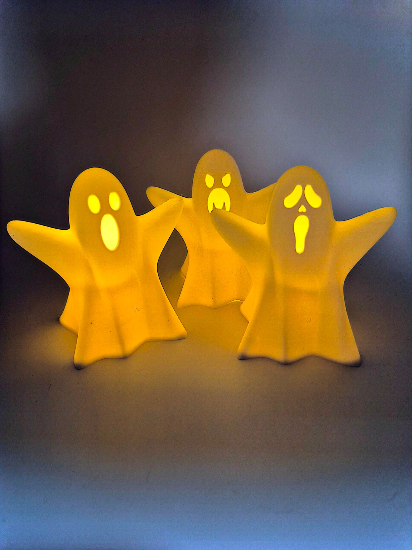 3 light up Ghosts each with a Tea Light